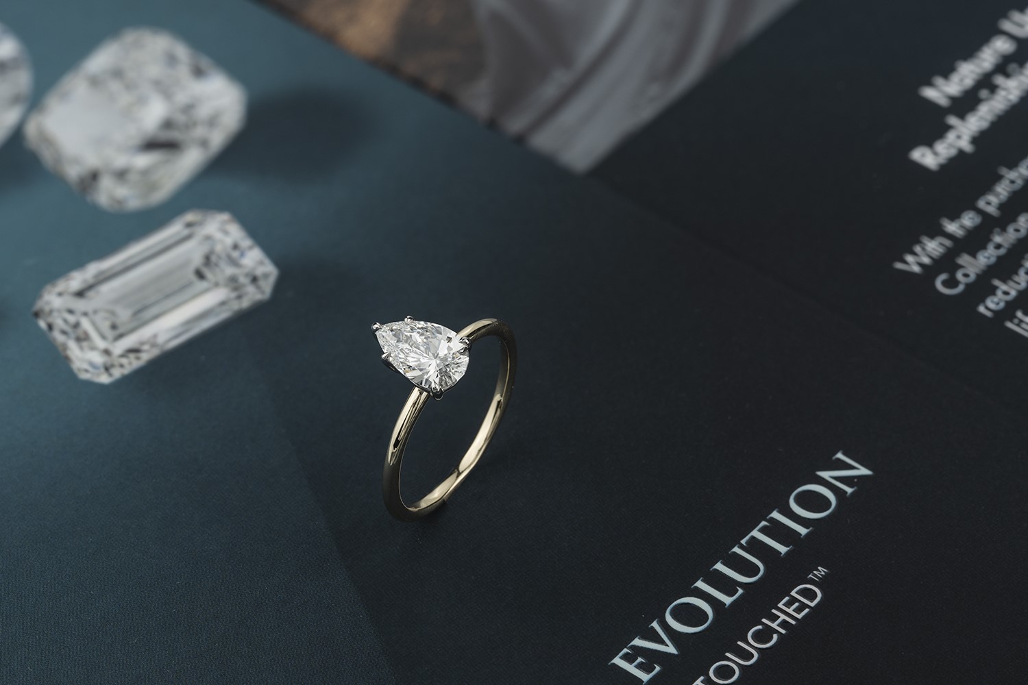 Pear cut lab grown diamond solitaire ring