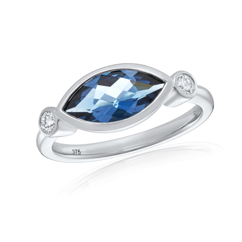 white gold marquise cut London blue topaz ring with 2 diamonds either side 